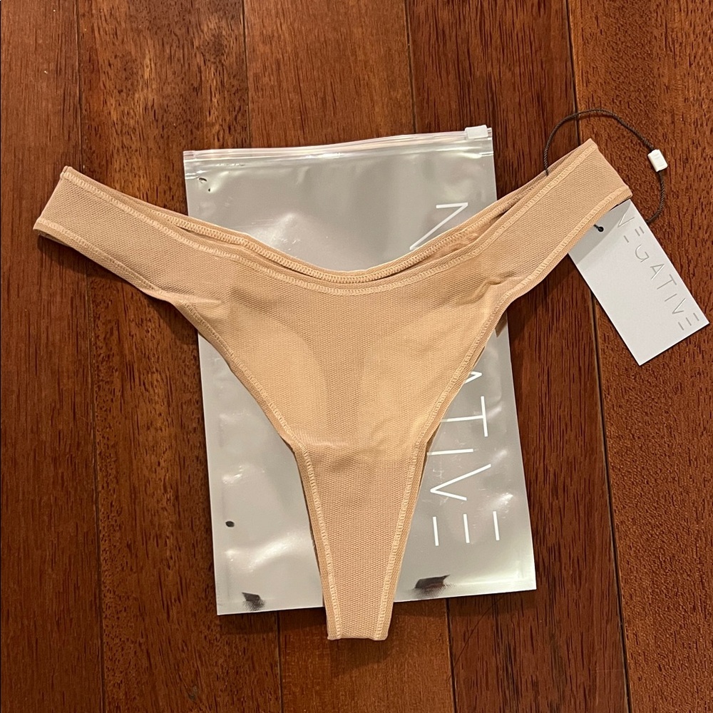 Negative Underwear Sieve Dipped Thong in Buff - Size S